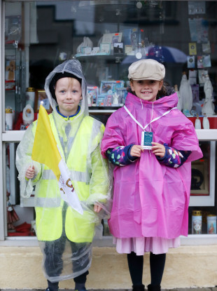 Paddy (6) and Molly Hunt (8) from Co Mayo waiting to see the pope at Knock Shrine this morning.