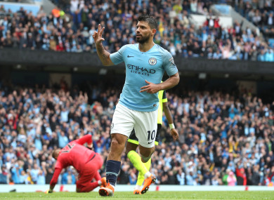 Sergio Aguero celebrates scoring against Huddersfield.