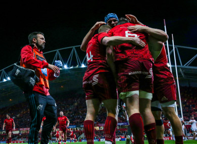 Munster celebrate Peter O'Mahony's try.