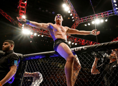 Darren Till makes weight for his upcoming championship bout with Tyron Woodley.