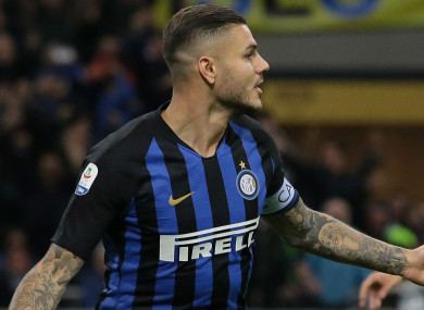 Mauro Icardi celebrates scoring against AC Milan.