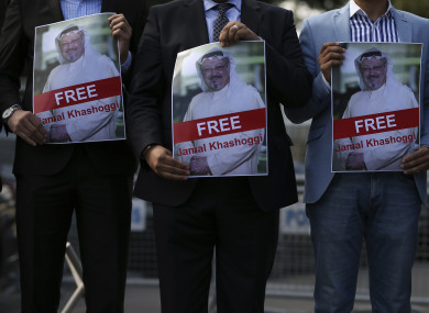 Holding pictures of missing Saudi writer Jamal Khashoggi, people gather in his support, near the Saudi Arabia consulate in Istanbul.