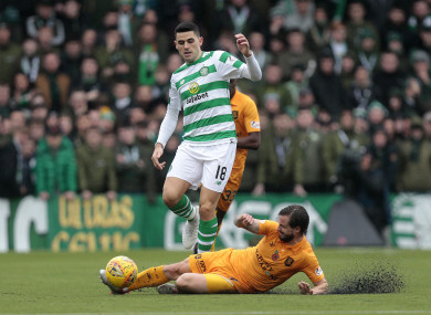 Livingston's Keaghan Jacobs (right) vies with Celtic's Tom Rogic.