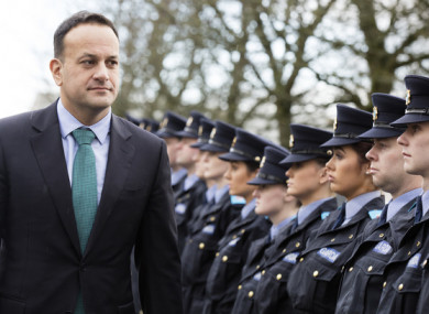 Taoiseach Leo Varadkar reviews a trainee guard of honour on his first visit to Templemore Garda Training College in County Tipperary.