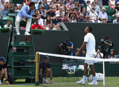 The Australian argues with an umpire at Wimbledon last summer.
