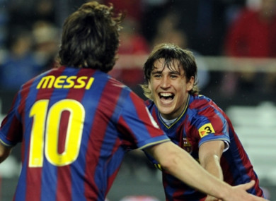 Bojan celebrates a goal with Lionel Messi during their time together at Barcelona.