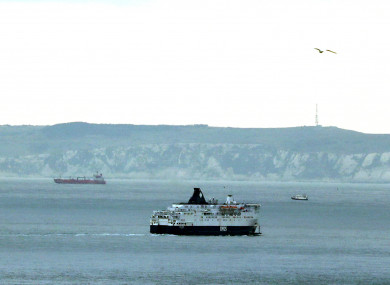 A ferry heads towards the coast of France from Dover, Kent.