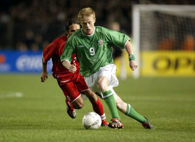 Damien Duff of Ireland and Ricardo Cabanas of Switzerland pictured competing in a Euro 2004 qualifier.