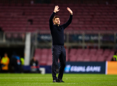 The Tottenham manager salutes the travelling fans last night.