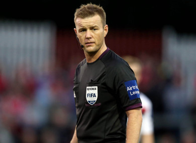 Referee Alan Kelly.