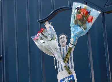 Tributes to the late Jeff Astle left on the gates at The Hawthorns.