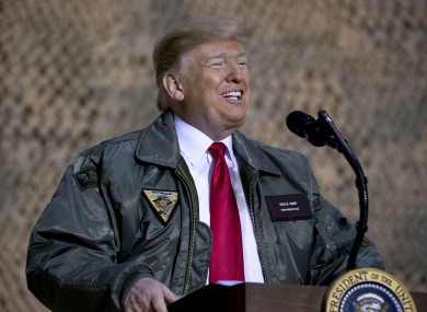 Donald Trump on his first trip to visit US troops deployed in a war zone since he was elected president two years ago