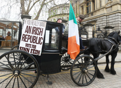 Thomas Clarke with Ronnie O’ Brien from Cabra in a replica horse and carriage outside Leinster House.