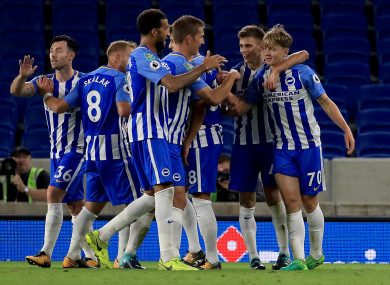 James Tilley (far right) is congratulated by team-mates after scoring the winner for Brighton against Barnet in the Carabao Cup in August 2017.