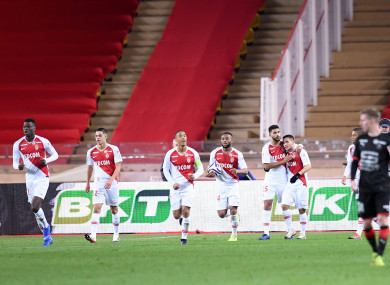 Monaco players celebrate.