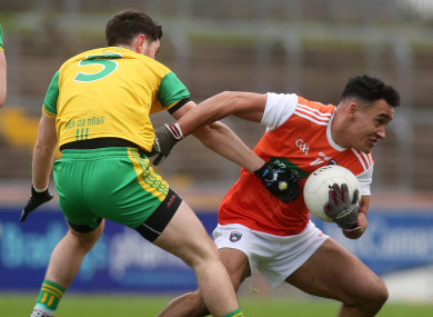 Jemar Hall is tackled by Ryan McHugh.
