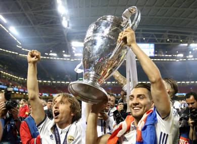Real Madrid's Luka Modric (left) celebrates with the trophy during the Uefa Champions League Final.