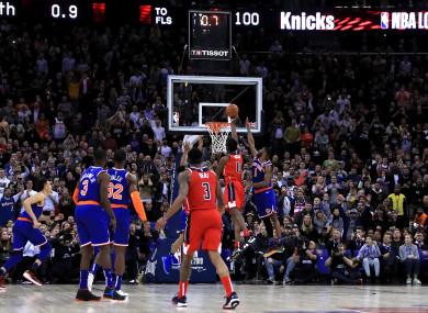Washington Wizards' Thomas Bryant is fouled as he shoots.