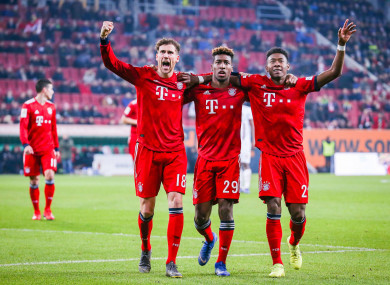 Leon Goretzka, Kingsley Coman and David Alaba celebrate together.
