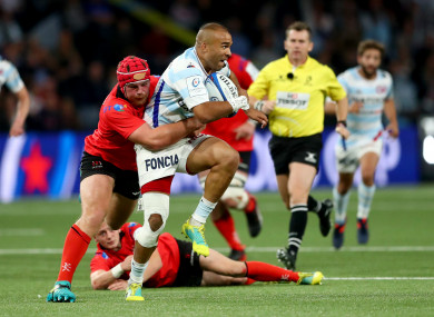 Eric O'Sullivan tackle Racing's Simon Zebo.
