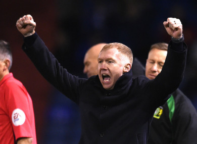 Oldham Athletic manager Paul Scholes celebrates one of four goals scored by his side during his first game in charge.
