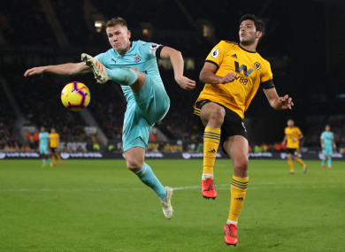 Newcastle United's Matt Ritchie and Wolverhampton Wanderers' Raul Jimenez.