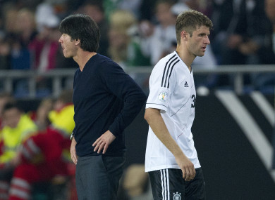 Mueller (right) is unhappy with the German international manager (left).