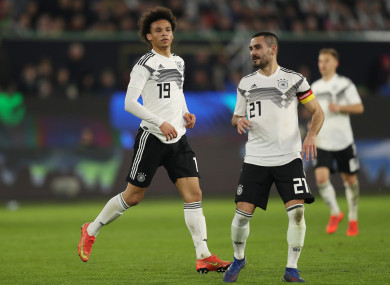 Racist abuse was aimed at Leroy Sane (left) and Ilkay Gundogan.