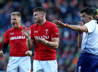 Gareth Anscombe and Dan Biggar celebrate at the full-time whistle.