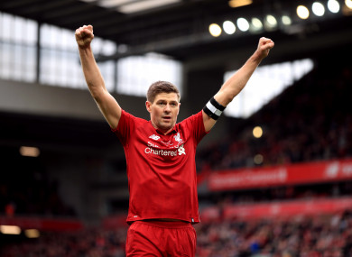 Gerrard celebrates scoring during the Legends match at Anfield against AC Milan.