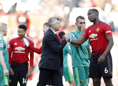 The Norwegian shakes hands with Paul Pogba after full-time at Old Trafford.