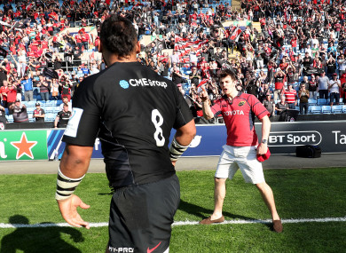 The Saracens player is greeted by an irate fan.
