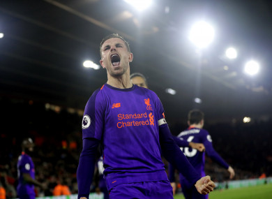 Henderson celebrates his late goal on Friday.