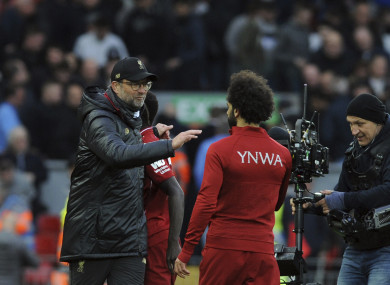 Jurgen Klopp, left, celebrates with Mohamed Salah.