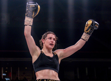 Katie Taylor celebrates her world-title unification victory over Rose Volante in March.