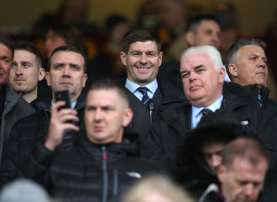 Steven Gerrard watches on from the stands as he serves a one-game touchline ban.