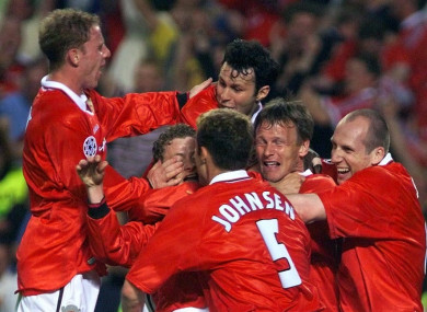Solsjkaer is mobbed by team-mates after his winner in the 1999 Champions League final.