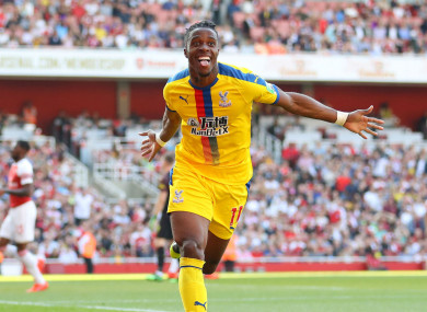 Wilfried Zaha celebrates his goal against Arsenal