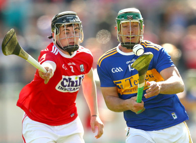 Cork's Darragh Fitzgibbon in action against Tipperary's John O'Dwyer.