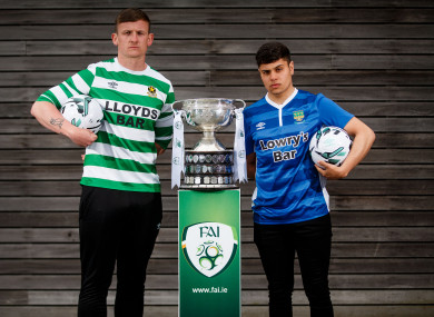 Sheriff YC's Gavin McDermott with Rodrigo Goncalves of St. Michael's at yesterday's media day.