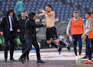 Safe: Bologna's Mattia Destro celebrates.
