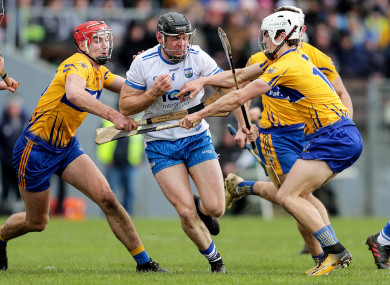 Clare and Waterford players in action in Walsh Park in March.