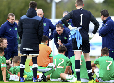 Manager Tom Mohan (centre) speaking to his players.