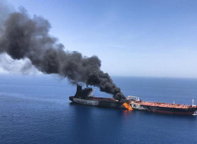 An oil tanker is on fire in the sea of Oman.