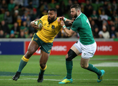 Australia's Samu Kerevi under pressure from Ireland's Robbie Henshaw during their game in Melbourne on 16 June, 2018.