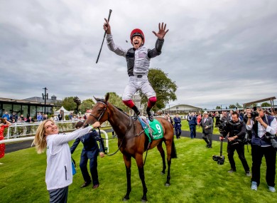 Frankie Dettori celebrates winning The Kerrygold Irish Oaks on Star Catcher.