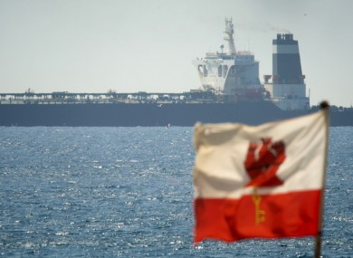 The Grace 1 super-tanker with the Gibraltarian flag in the foreground.