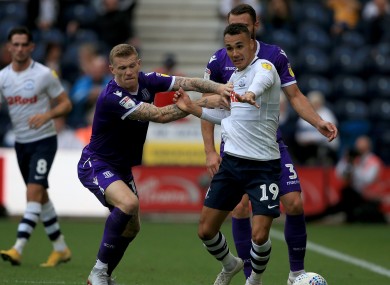 Burke (right) facing Stoke City's James McClean at the beginning of last season.