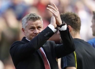 Ole Gunnar Solskjaer applauds supporters.