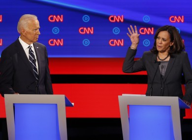 Former US Vice President Joe Biden and California Sen. Kamala Harris participate on the second night of the CNN Democratic Presidential Debate at the Fox Theater in Detroit